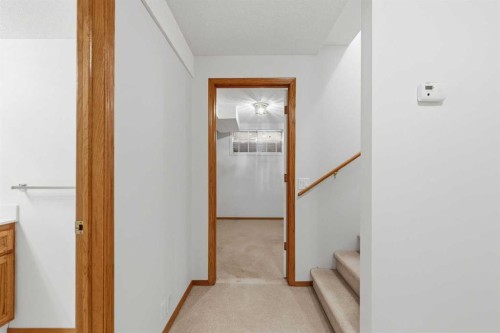 28 Sunlake Circle Se, Calgary, AB - Indoor Photo Showing Other Room