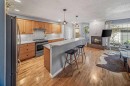 2-306 14 Avenue Ne, Calgary, AB  - Indoor Photo Showing Kitchen With Fireplace 