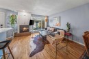 2-306 14 Avenue Ne, Calgary, AB  - Indoor Photo Showing Living Room With Fireplace 