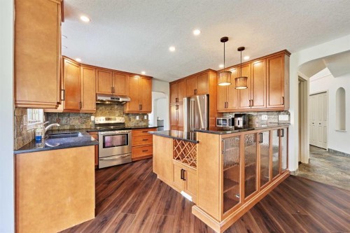 243 Hampshire Close Nw, Calgary, AB - Indoor Photo Showing Kitchen With Stainless Steel Kitchen With Double Sink