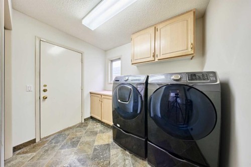 243 Hampshire Close Nw, Calgary, AB - Indoor Photo Showing Laundry Room