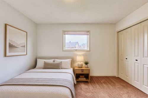 243 Hampshire Close Nw, Calgary, AB - Indoor Photo Showing Bedroom