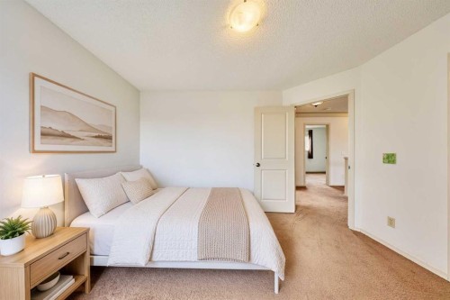 243 Hampshire Close Nw, Calgary, AB - Indoor Photo Showing Bedroom
