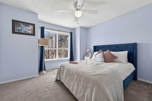 32 Erin Woods Court Se, Calgary, AB - Indoor Photo Showing Bedroom