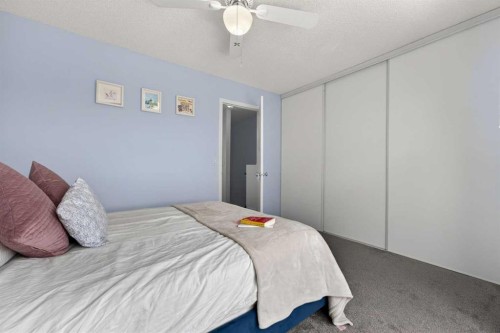 32 Erin Woods Court Se, Calgary, AB - Indoor Photo Showing Bedroom