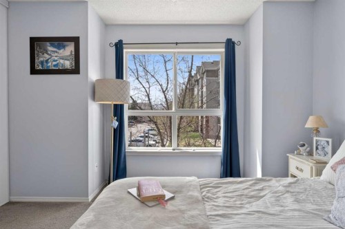 32 Erin Woods Court Se, Calgary, AB - Indoor Photo Showing Bedroom