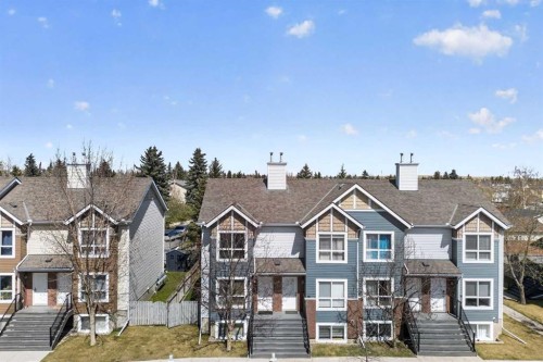 32 Erin Woods Court Se, Calgary, AB - Outdoor With Facade