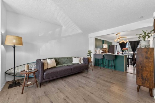32 Erin Woods Court Se, Calgary, AB - Indoor Photo Showing Living Room