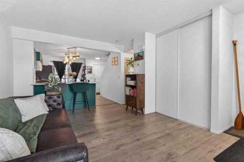 32 Erin Woods Court Se, Calgary, AB - Indoor Photo Showing Living Room