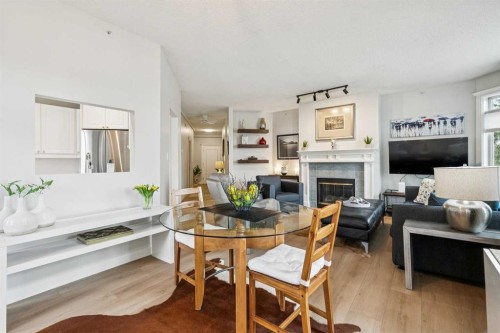 314-910 70 Avenue Sw, Calgary, AB - Indoor With Fireplace