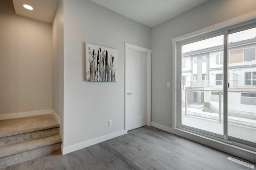 212 Shawnee Square Sw, Calgary, AB - Indoor Photo Showing Other Room