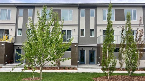 212 Shawnee Square Sw, Calgary, AB - Outdoor With Facade