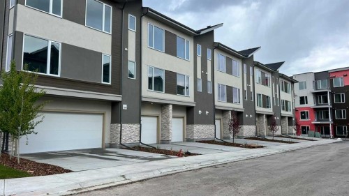 212 Shawnee Square Sw, Calgary, AB - Outdoor With Facade