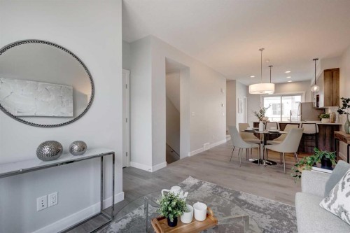 212 Shawnee Square Sw, Calgary, AB - Indoor Photo Showing Dining Room