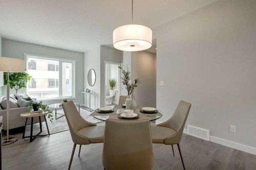 212 Shawnee Square Sw, Calgary, AB - Indoor Photo Showing Dining Room