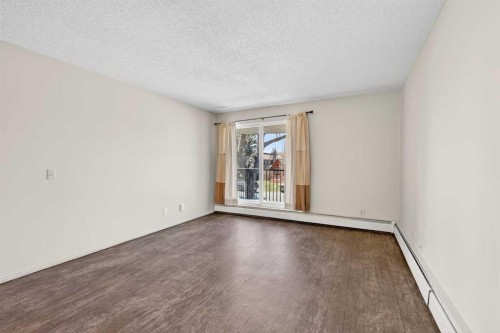 204-36 Glenbrook Crescent, Cochrane, AB - Indoor Photo Showing Other Room