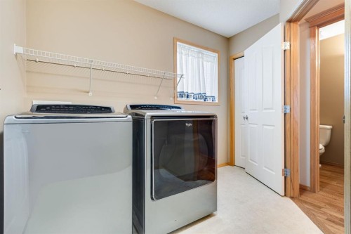 281 Bridlemeadows Common Sw, Calgary, AB - Indoor Photo Showing Laundry Room