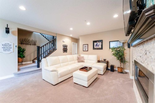 149 Muirfield Boulevard, Lyalta, AB - Indoor Photo Showing Living Room With Fireplace