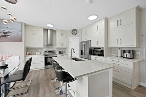 2386 Fairways Circle Nw, Airdrie, AB - Indoor Photo Showing Kitchen With Upgraded Kitchen