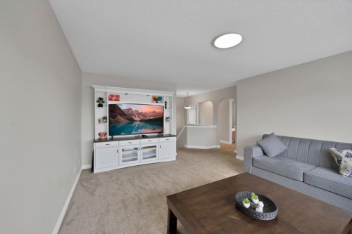 2386 Fairways Circle Nw, Airdrie, AB - Indoor Photo Showing Living Room