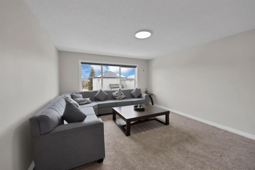2386 Fairways Circle Nw, Airdrie, AB - Indoor Photo Showing Living Room