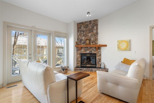 20 Ranch Road, Okotoks, AB - Indoor Photo Showing Living Room With Fireplace
