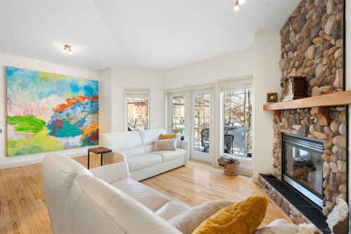20 Ranch Road, Okotoks, AB - Indoor Photo Showing Living Room With Fireplace