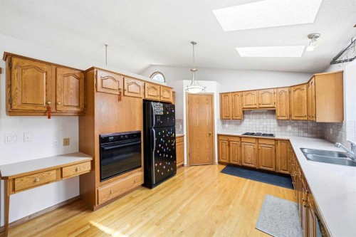 6 Christie Briar Lane Sw, Calgary, AB - Indoor Photo Showing Kitchen With Double Sink