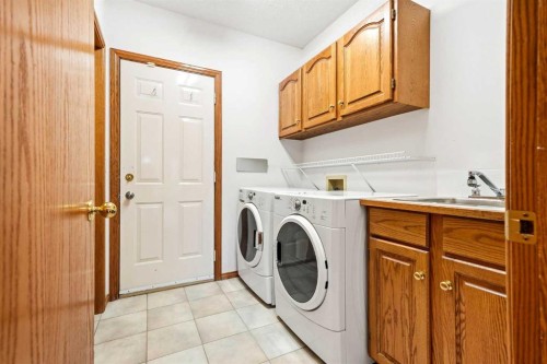 6 Christie Briar Lane Sw, Calgary, AB - Indoor Photo Showing Laundry Room