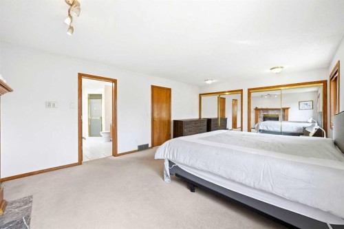6 Christie Briar Lane Sw, Calgary, AB - Indoor Photo Showing Bedroom