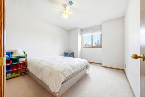 6 Christie Briar Lane Sw, Calgary, AB - Indoor Photo Showing Bedroom