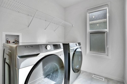 195 Lucas Common Nw, Calgary, AB - Indoor Photo Showing Laundry Room
