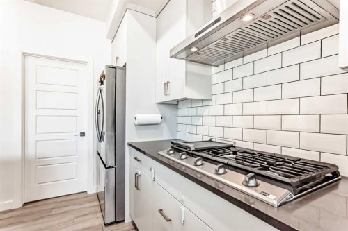 287 Amblehurst Way Nw, Calgary, AB - Indoor Photo Showing Kitchen With Upgraded Kitchen