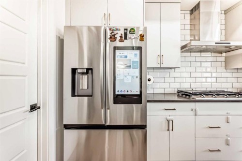 287 Amblehurst Way Nw, Calgary, AB - Indoor Photo Showing Kitchen With Upgraded Kitchen