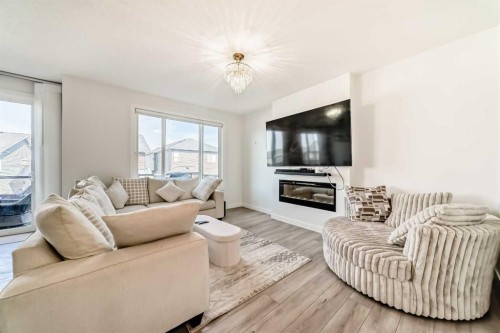 287 Amblehurst Way Nw, Calgary, AB - Indoor Photo Showing Living Room