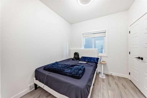 287 Amblehurst Way Nw, Calgary, AB - Indoor Photo Showing Bedroom