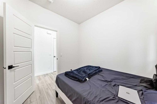 287 Amblehurst Way Nw, Calgary, AB - Indoor Photo Showing Bedroom