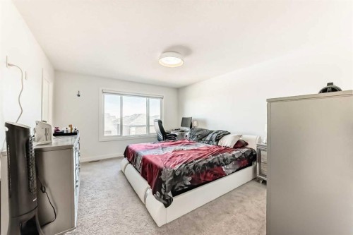 287 Amblehurst Way Nw, Calgary, AB - Indoor Photo Showing Bedroom