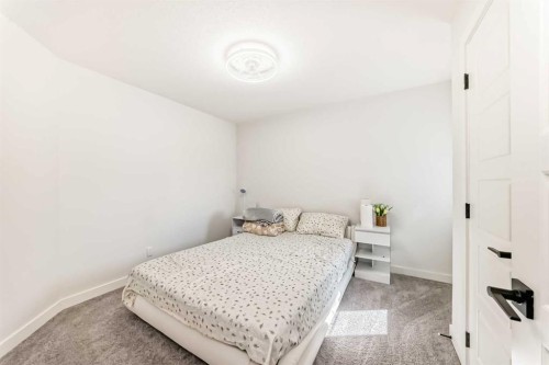 287 Amblehurst Way Nw, Calgary, AB - Indoor Photo Showing Bedroom
