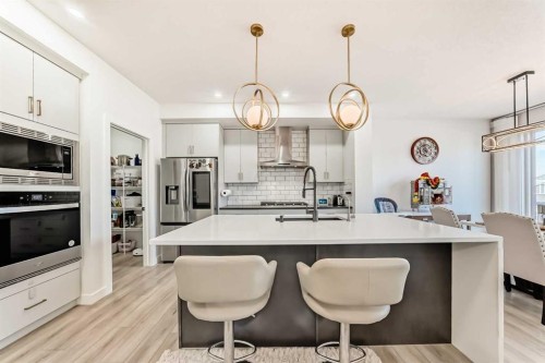 287 Amblehurst Way Nw, Calgary, AB - Indoor Photo Showing Kitchen With Upgraded Kitchen