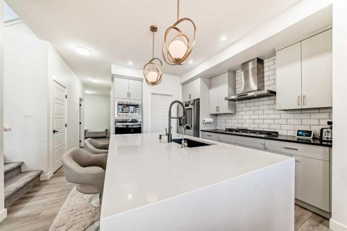 287 Amblehurst Way Nw, Calgary, AB - Indoor Photo Showing Kitchen With Upgraded Kitchen