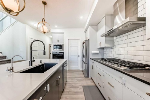 287 Amblehurst Way Nw, Calgary, AB - Indoor Photo Showing Kitchen With Upgraded Kitchen