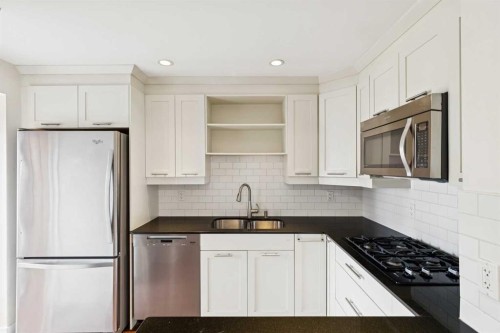 2128 Broadview Road Nw, Calgary, AB - Indoor Photo Showing Kitchen With Double Sink