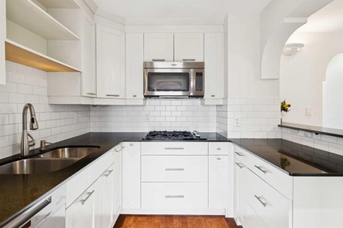2128 Broadview Road Nw, Calgary, AB - Indoor Photo Showing Kitchen With Double Sink