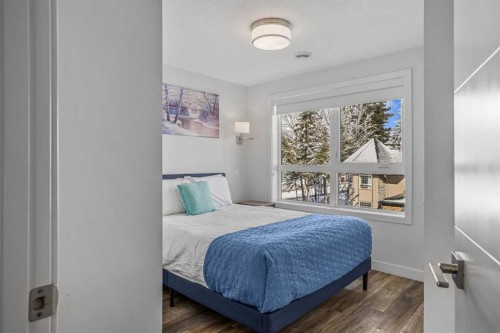 205-105 Kananaskis Way, Canmore, AB - Indoor Photo Showing Bedroom