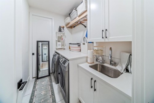 103 Aspen Summit Close Sw, Calgary, AB - Indoor Photo Showing Laundry Room