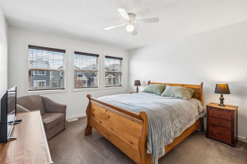150 River Heights Crescent, Cochrane, AB - Indoor Photo Showing Bedroom