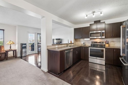 150 River Heights Crescent, Cochrane, AB - Indoor Photo Showing Kitchen