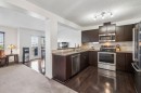 150 River Heights Crescent, Cochrane, AB  - Indoor Photo Showing Kitchen 