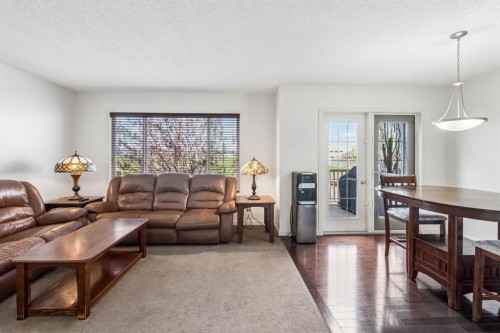 150 River Heights Crescent, Cochrane, AB - Indoor Photo Showing Living Room